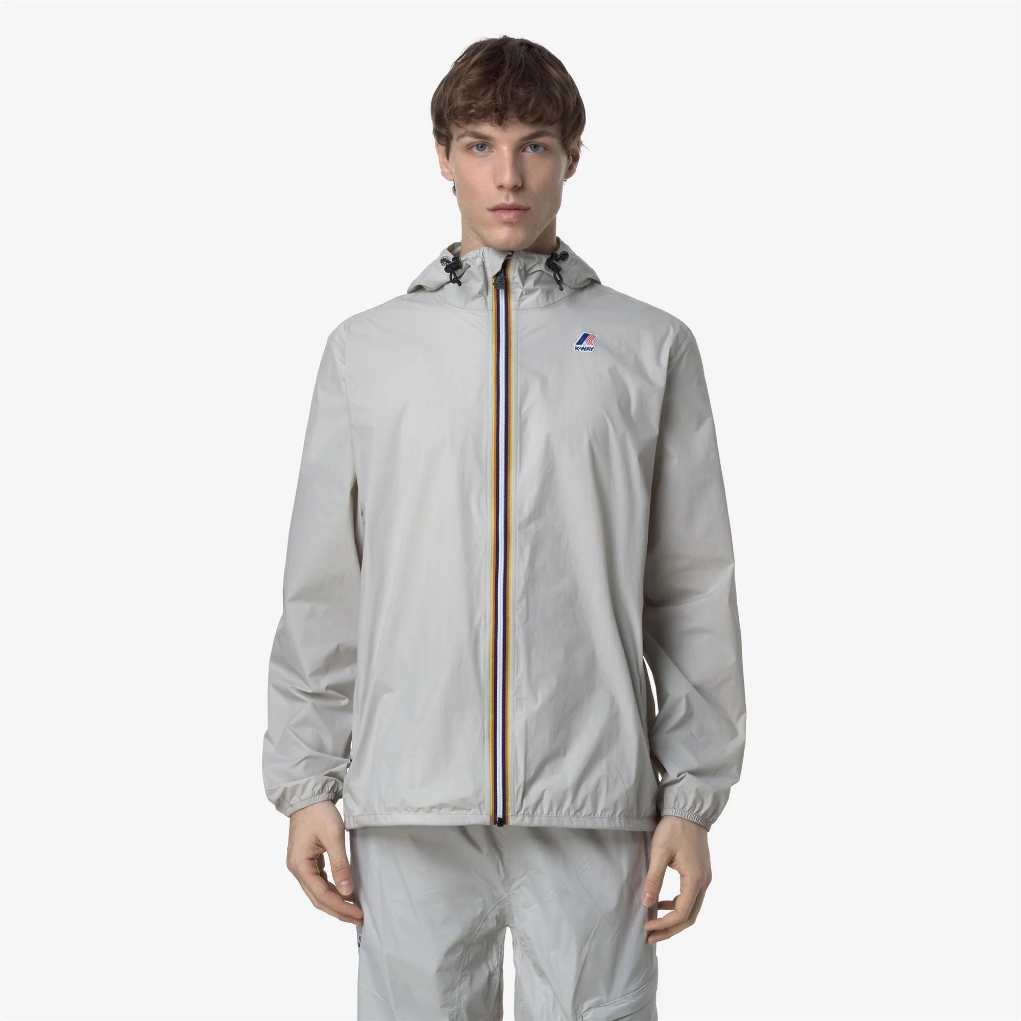 Le Vrai 4.0 Claude - Unisex Packable Full Zip Waterproof  Rain Jacket in Beige Lt