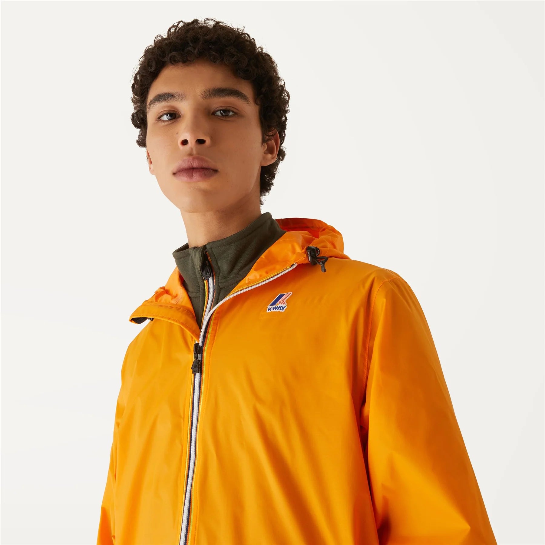 Claude - Veste de pluie pliable entièrement zippée pour enfants en orange