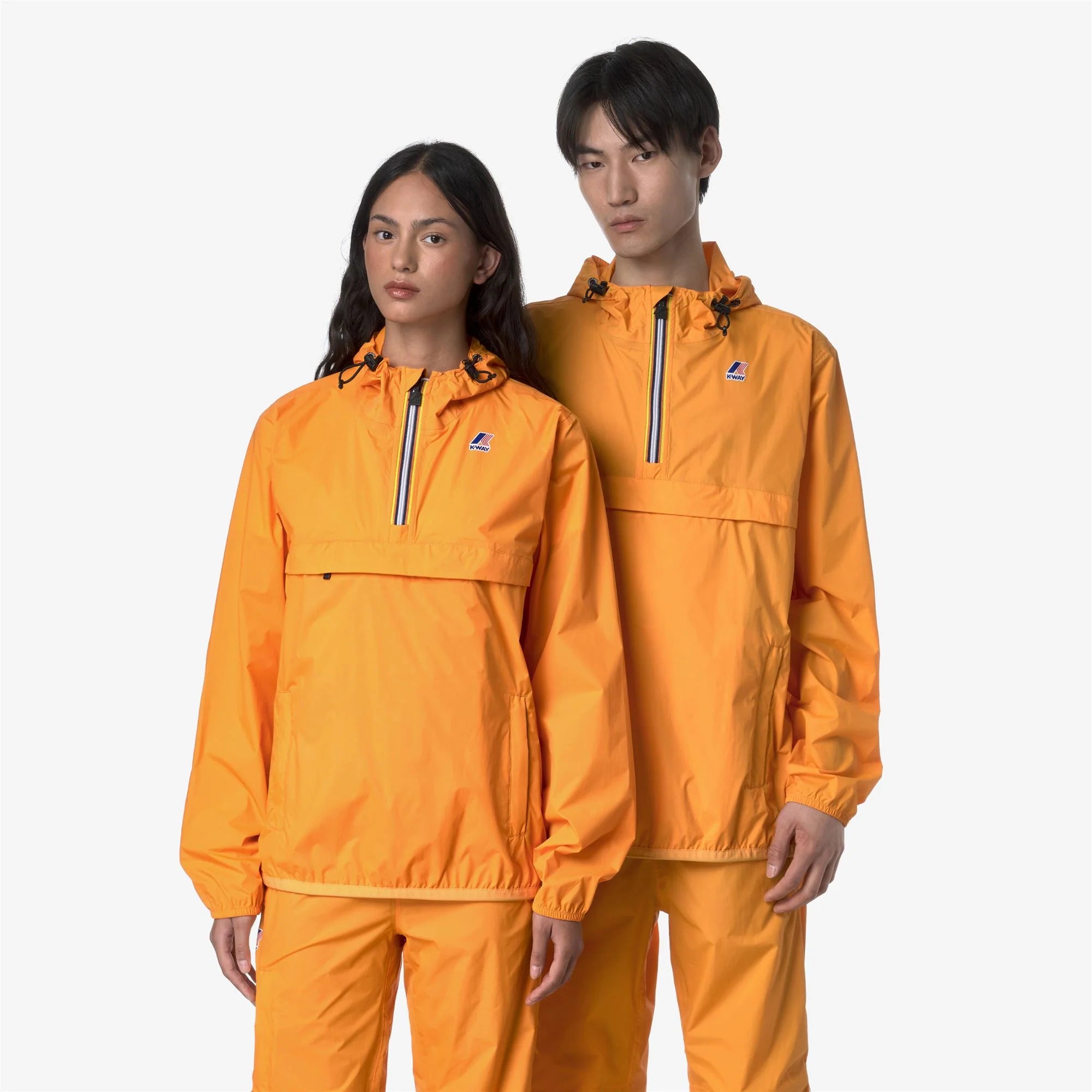 Le Vrai 4.0 Leon - Unisex Packable Quarter Zip Rain Jacket in Orange