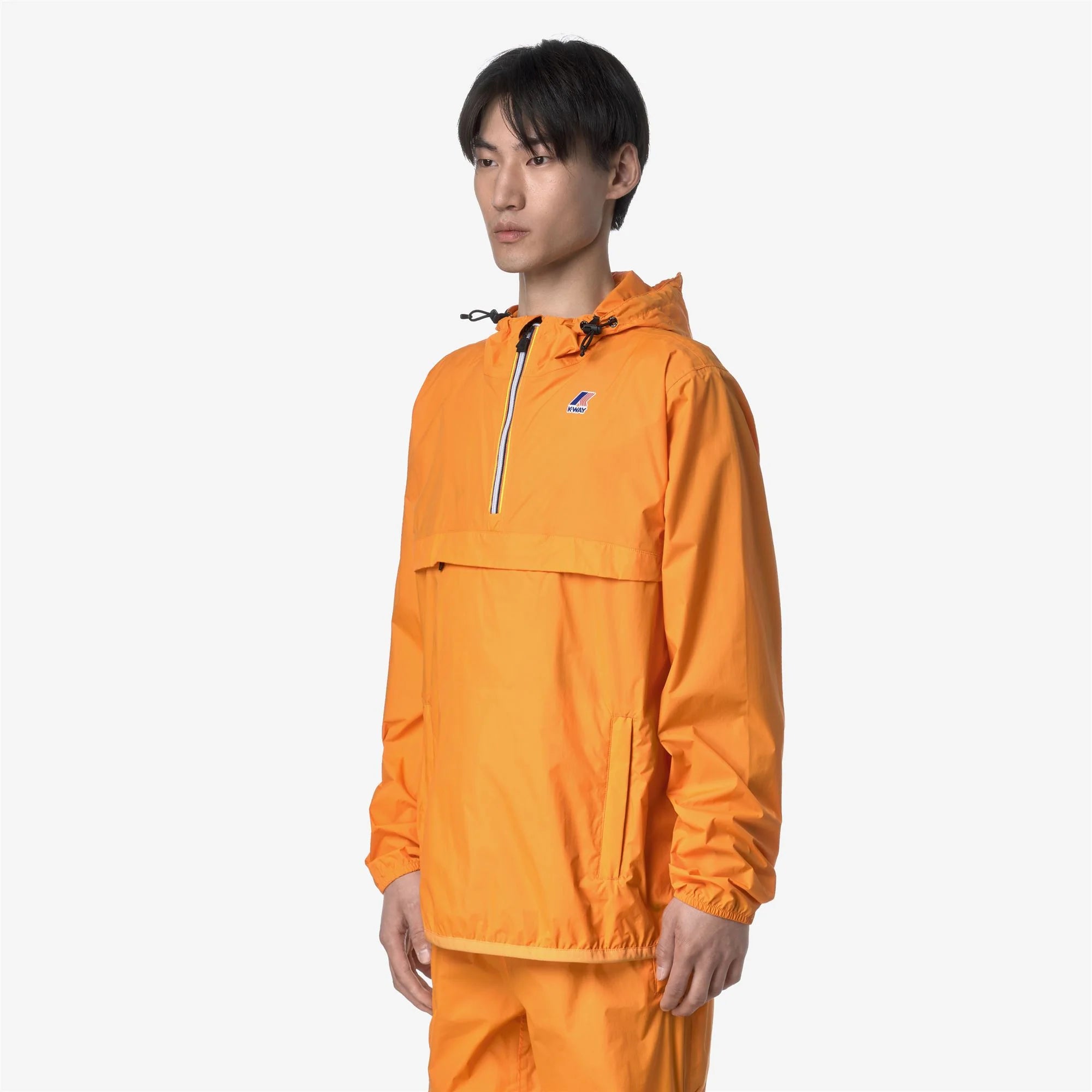 Le Vrai 4.0 Leon - Unisex Packable Quarter Zip Rain Jacket in Orange