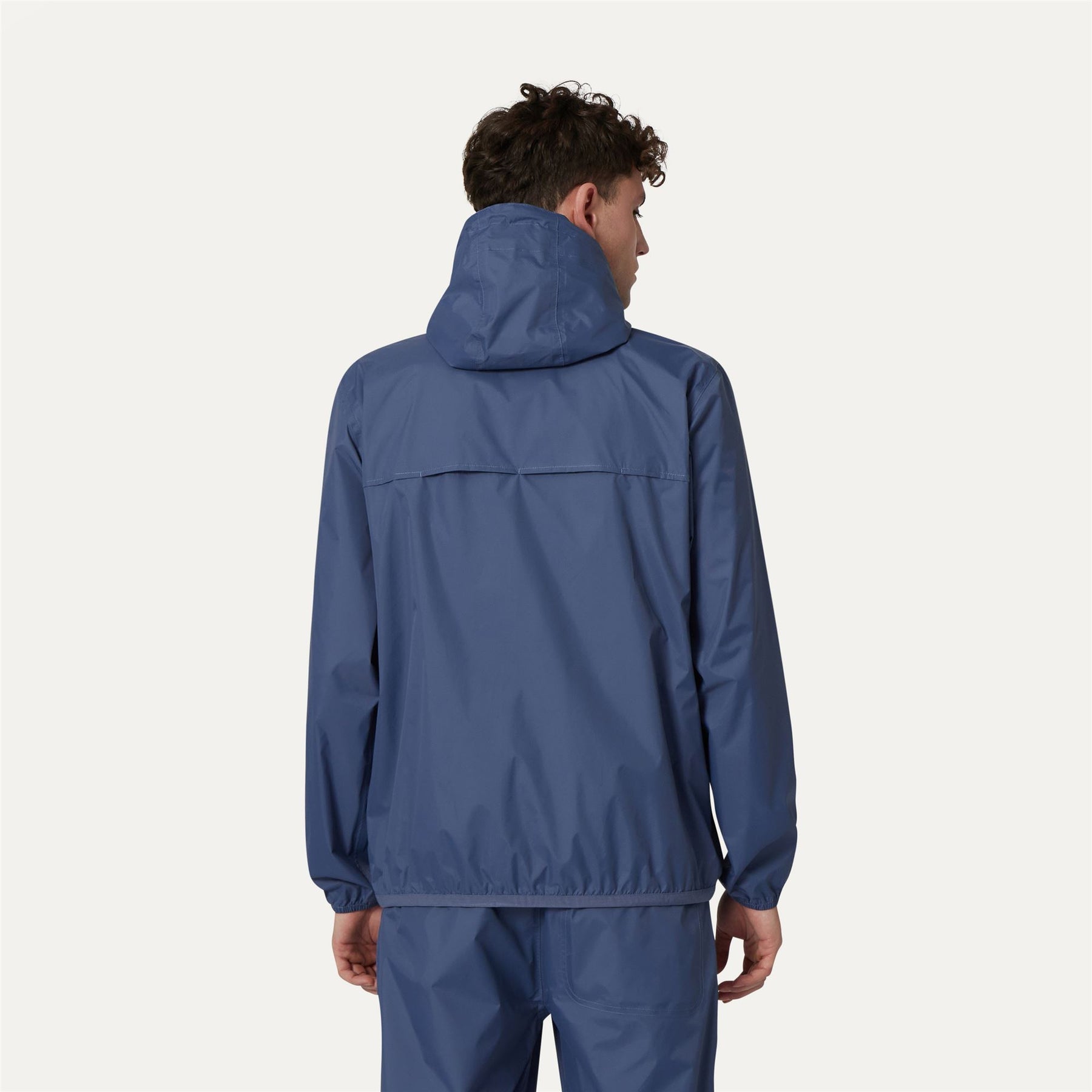 Claude - Unisex Packable Full Zip Waterproof  Rain Jacket in Blue Indigo