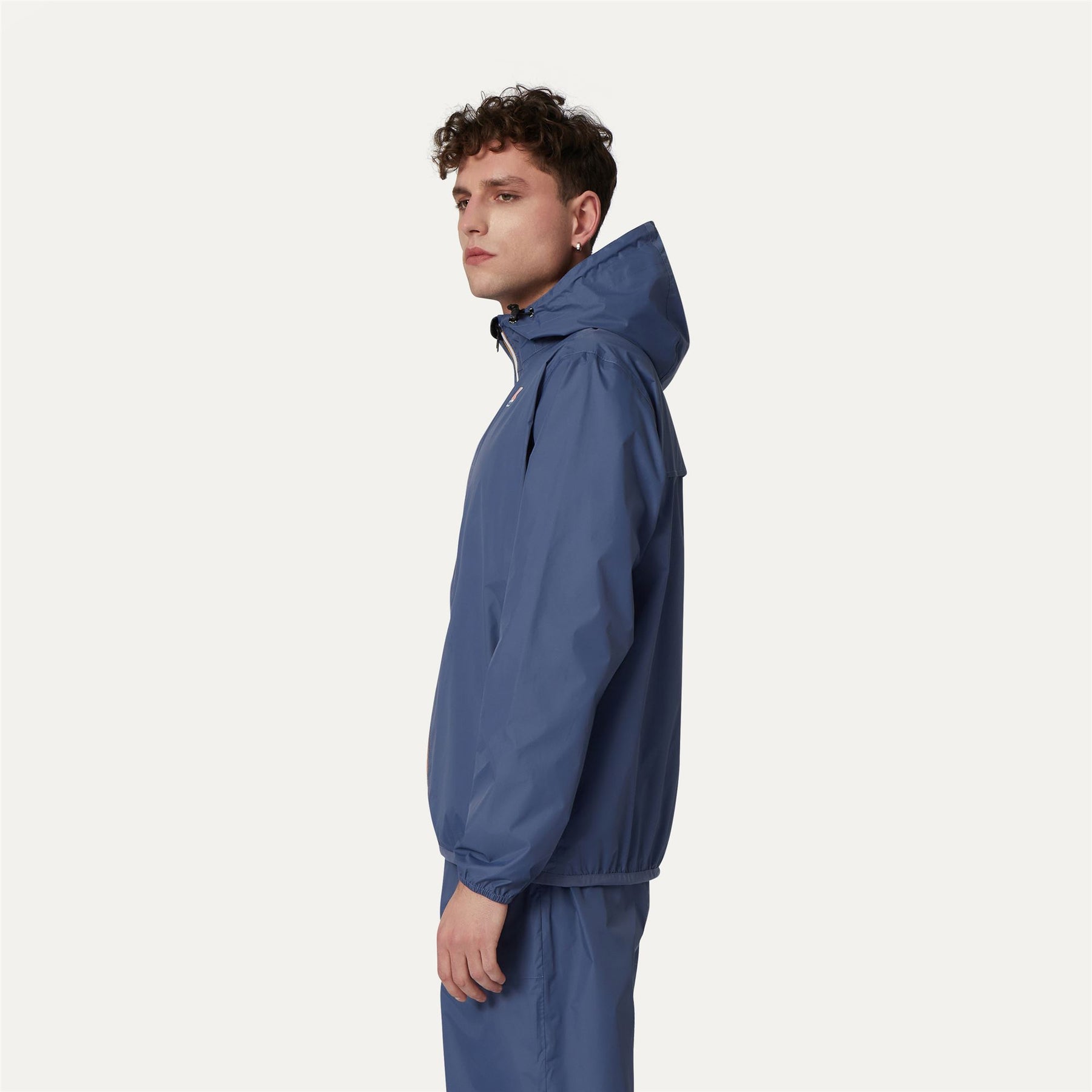 Claude - Unisex Packable Full Zip Waterproof  Rain Jacket in Blue Indigo